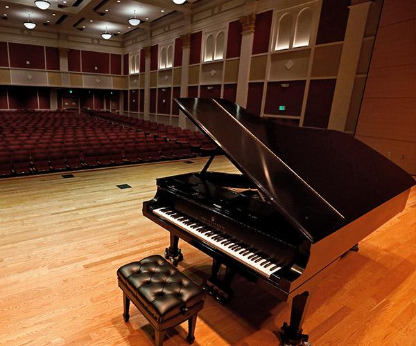 Concert piano on stage at the university theatre